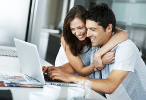 Couple Reviewing Loan Requirements Online